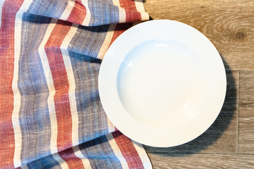 White Plate on a Tablecloth