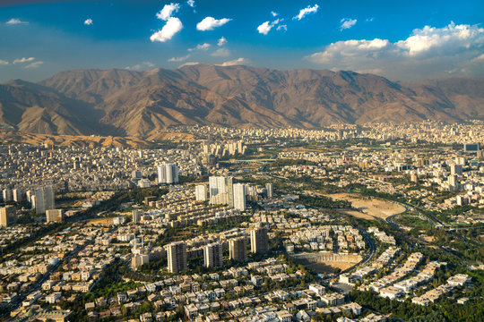 Aerial view of Tehran facing North towards the Alborz Mountains, Tehran, Iran
