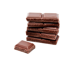 Dark milk chocolate bars stack isolated on a white