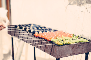 Barbecue grill, tomato, pepper, eggplant salad, shallow focus, vintage