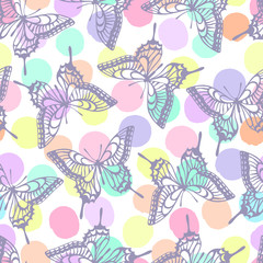 Seamless pattern with butterflies on a polka dot background.