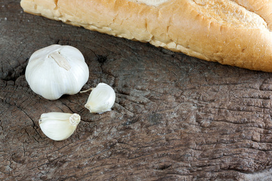 Garlic cloves on old wood