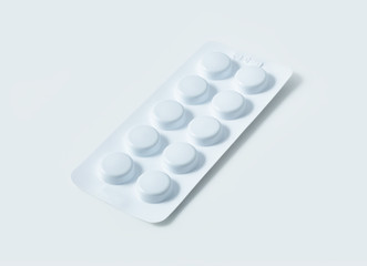 Aluminium blister pack of pills. The capsules are packaged in blisters, isolated on a white background. Disease. Flu. Medications.