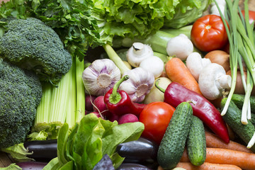 Background of fresh vegetables and greens closeup