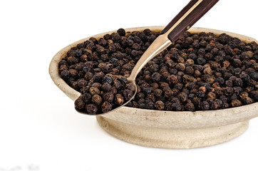 Black Pepper on Old Spoon and  Stone Bowl