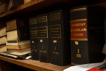  ISTANBUL - TURKEY - JANUARY 5, 2017 - Old hardcover Turkish law books on shelf 