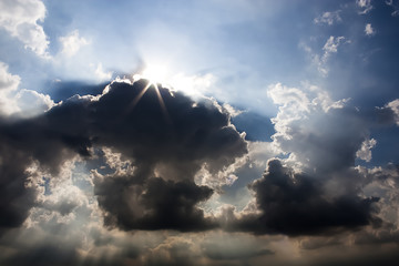 The dramatic storm Cloud and the sunlight ray.