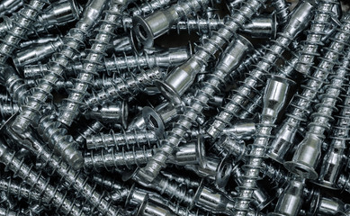 Metal furniture bolts. Background clous up