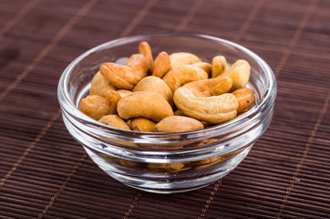 Nuts mix in a wooden plate