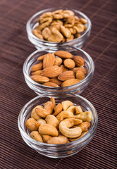 Nuts mix in a wooden plate