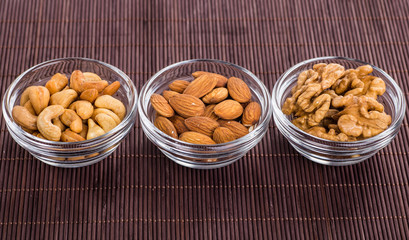 Nuts mix in a wooden plate