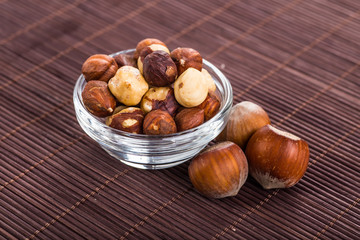 Nuts mix in a wooden plate