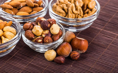 Nuts mix in a wooden plate