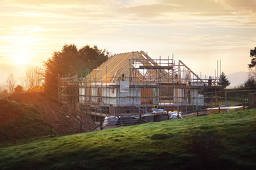 Building site with house under construction - obrazy, fototapety, plakaty