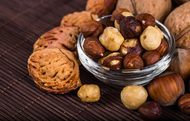 Nuts mix in a wooden plate