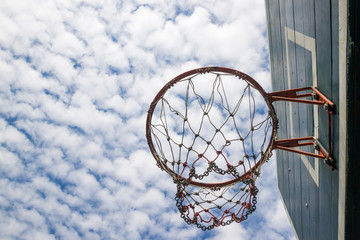 basketball outdoor court sport game Partly cloudy background