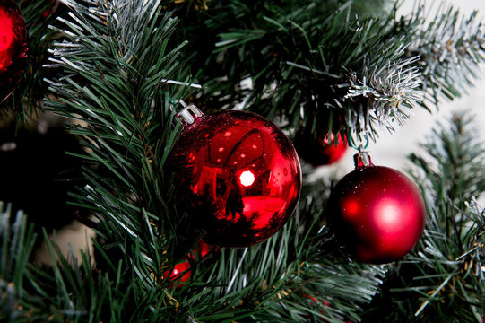 Closeup of Christmas-tree decorations. REd color of balls