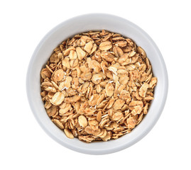 Bowl of muesli isolated on white background, top view