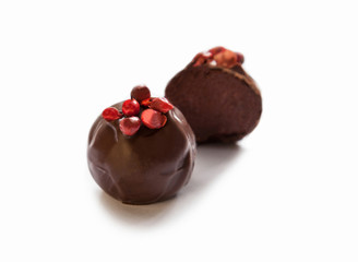 Chocolate sweets with red peper
