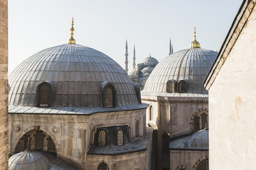 Fototapeta na wymiar Blue Mosque (Sultan Ahmet Mosque) and cupolas seen from Hagia So