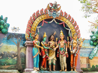 Fototapeta na wymiar Hindu sculptures near a main entrance in Batu Caves. Kuala Lumpur, Malaysia