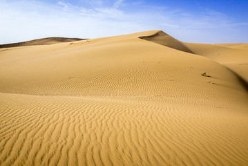 Fototapeta na wymiar Sand dunes of Maranjab Desert in Iran