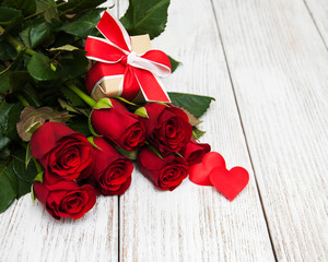 Red roses and gift box