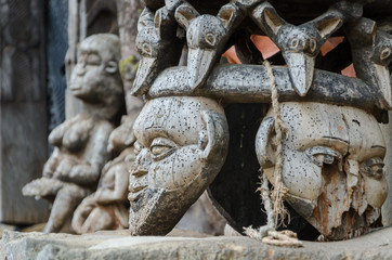 Chair and other African wood carvings at traditional Fon's palace in Bafut, Cameroon, Africa