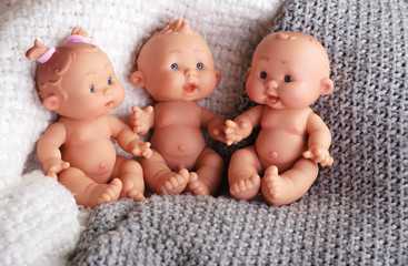 cute doll on a light textile