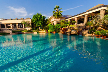 Swimming pool next to the building.