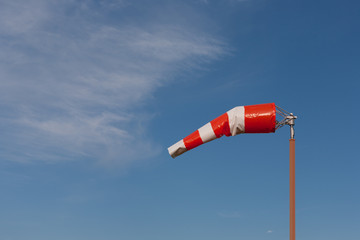 Aviation windsock and sky.