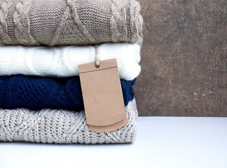 Stack of wool knitted warm sweater