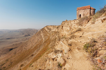 Fototapeta na wymiar Landscape with rocky mountains near Christian Monastery of David Gareji in Georgia. UNESCO World Heritage Site