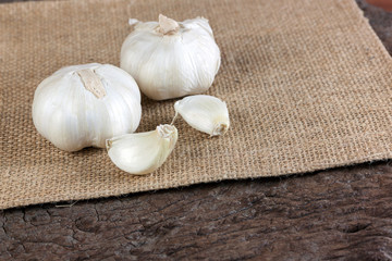 Garlic cloves on old wood