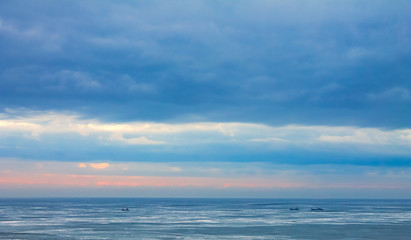ship sails on the frozen sea, winter, north. nature background