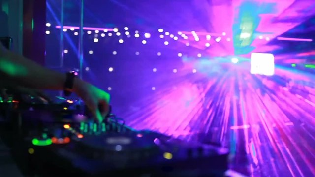 Dj mixing at the night club