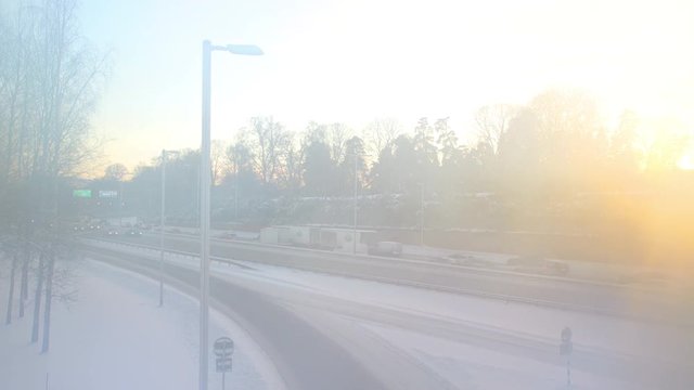 Traffic on highway E4 in Stockholm on a cold and wintry day.