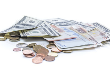 banknotes and coins in a purse 