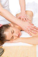 Hands massage therapist at the spa do classical massage woman