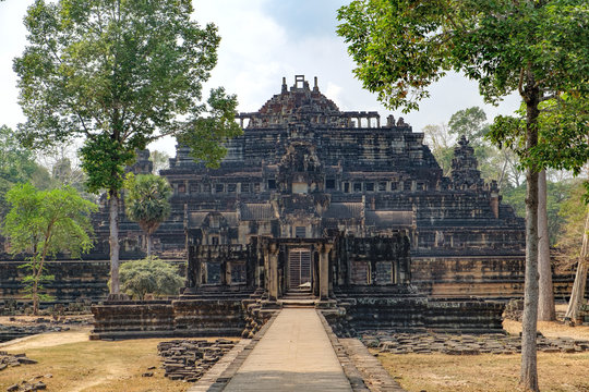 Baphuon Temple in Angkor Complex, Siem Reap, Cambodia. It is three-tiered temple mountain and dedicated to the Hindu God Shiva. Ancient Khmer architecture and famous Cambodian landmark, World Heritage