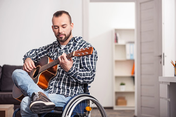Fototapeta na wymiar Young disabled guy performing a song