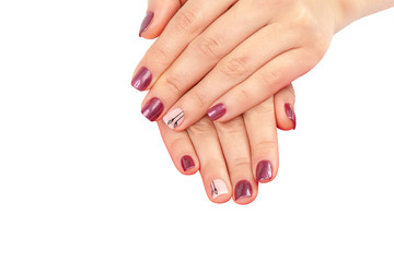 Beautiful female hands with manicure on pink.