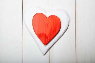 Heart on a white wooden background