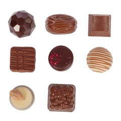 Pack, set or collection of gourmet bonbons, aka bon-bons and truffles made of dark, white and milk chocolate isolated on white background