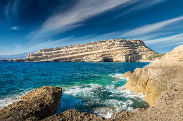 Matala beach on Crete island, Greece. View from the rocks. There are many caves near the beach.