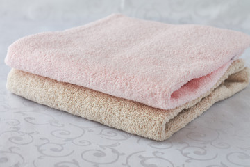 Fototapeta na wymiar Colored towels on a white background