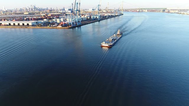 Aerial Footage of Tugboat and Barge on Delaware River Philadelphia PA