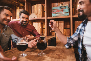 Nice happy men talking with each other