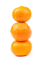 Fruits of a tangerine on a white background.