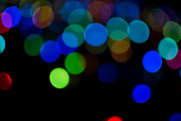 Circle colorful bokeh light celebrate at night, defocus light abstract background.